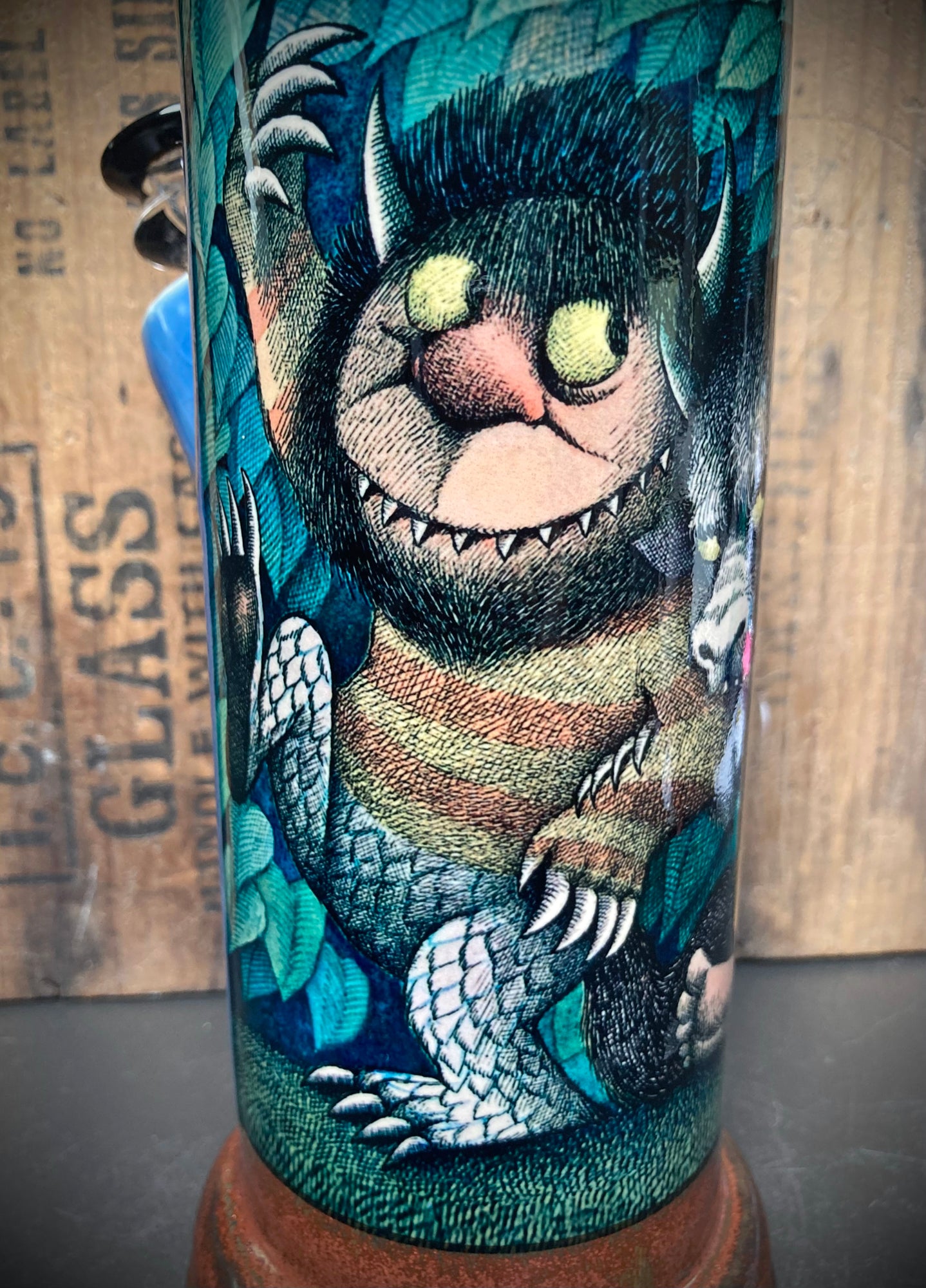 Detail of monsters face with yellow eyes from classic childrens book art