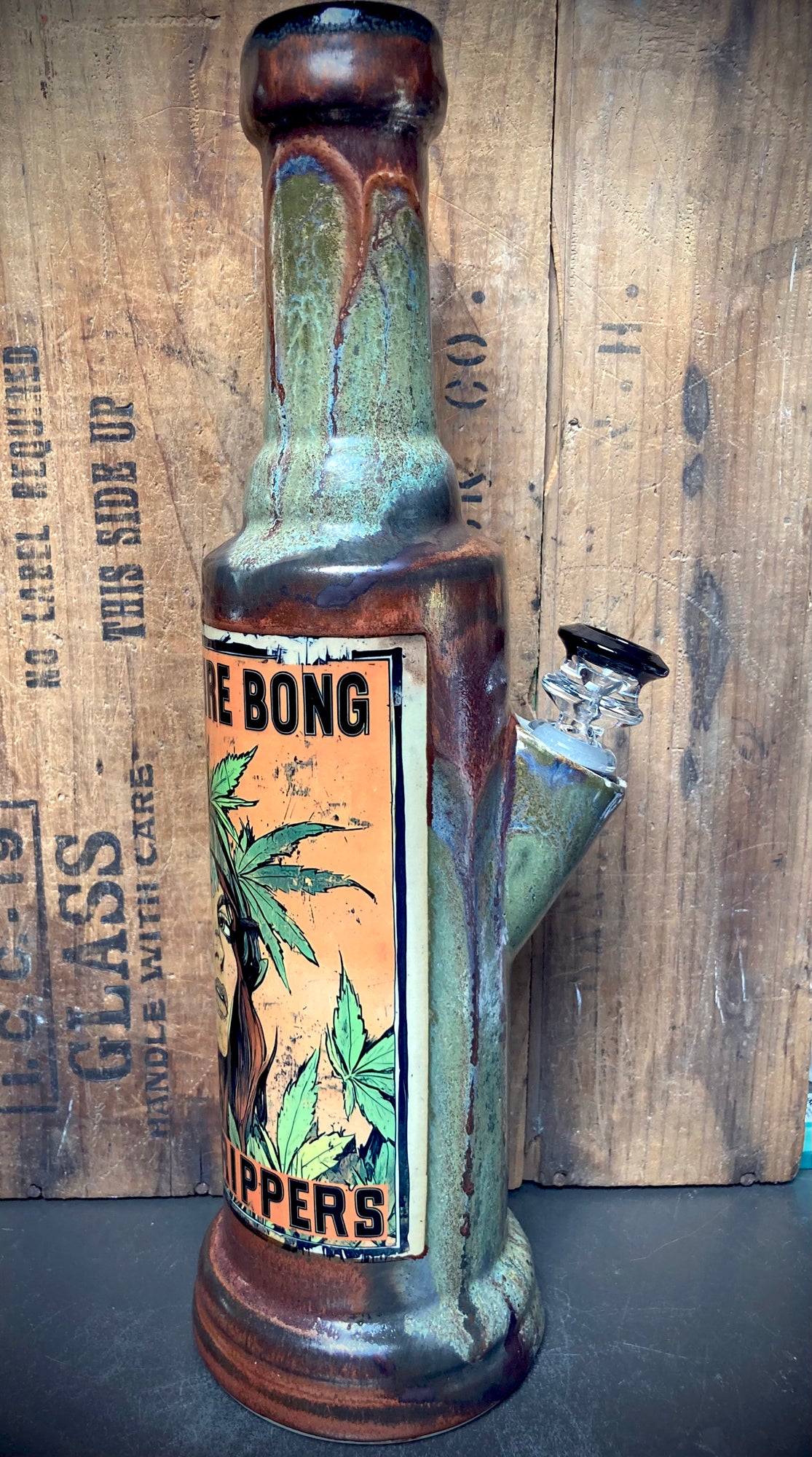 Berkshire Bong Rippers Ceramic Bong Football Baseball green brown glazed bottle style bong with leafy label and glass bowl