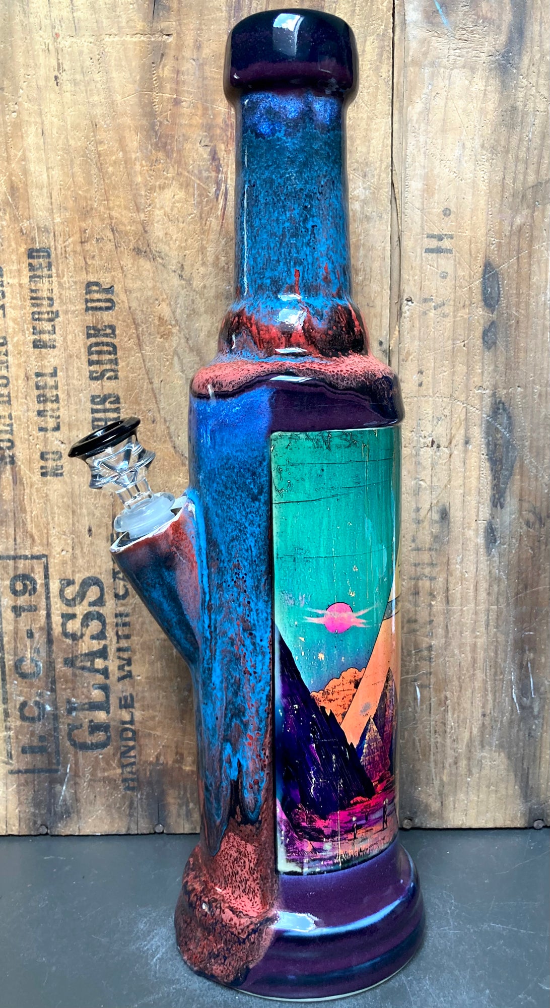 Teal and purple ceramic bong with pyramid sunset panel by Berkshire Bong Company The New Pyramids Ceramic Bong Mystical Energy