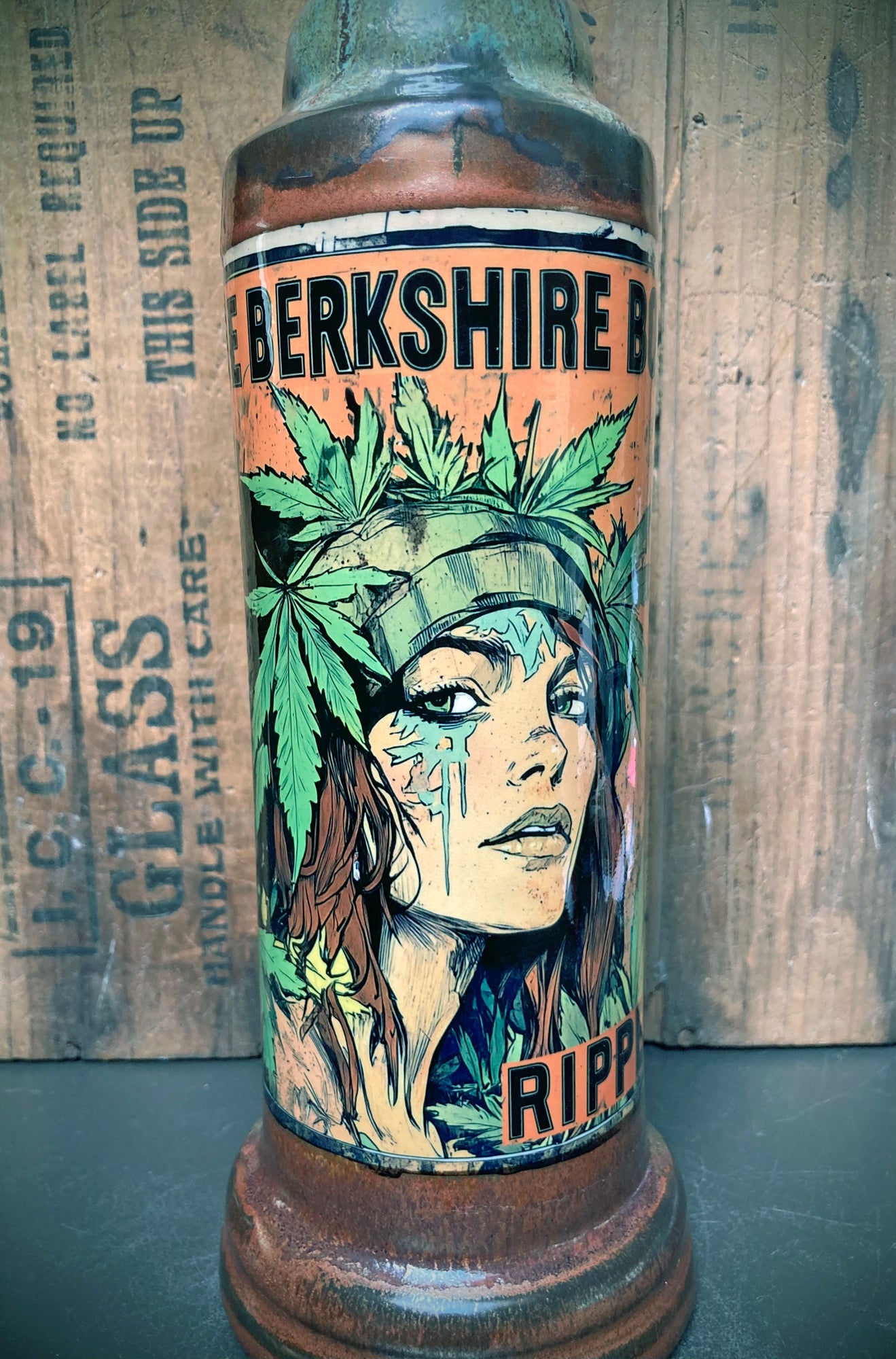 Berkshire Bong Rippers Ceramic Bong Football Baseball illustrated ceramic bong with female face and leaf design