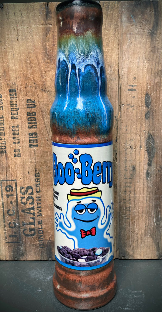 Vintage cartoon-style bong with blue Booberry cereal-inspired art.