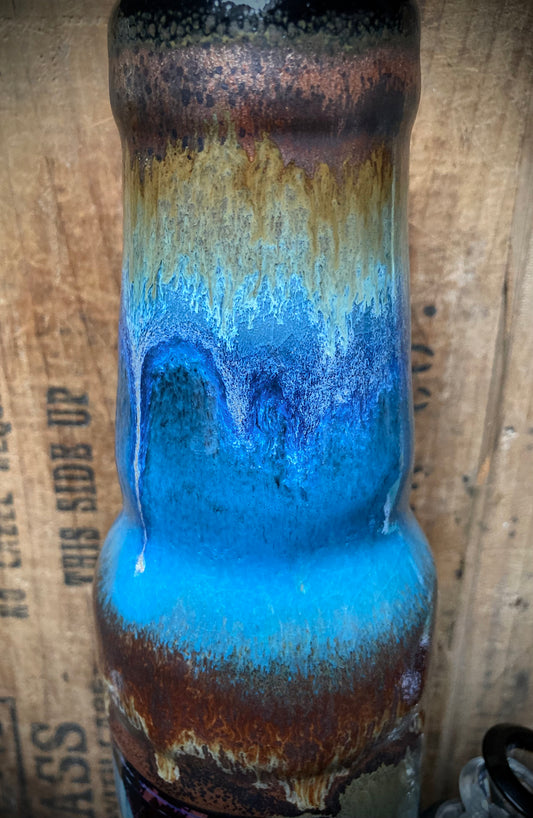 Ceramic Bong Starving Artist Skeleton Painting with Vibrant Blue and Earthy Tones for Unique Smoking Experience