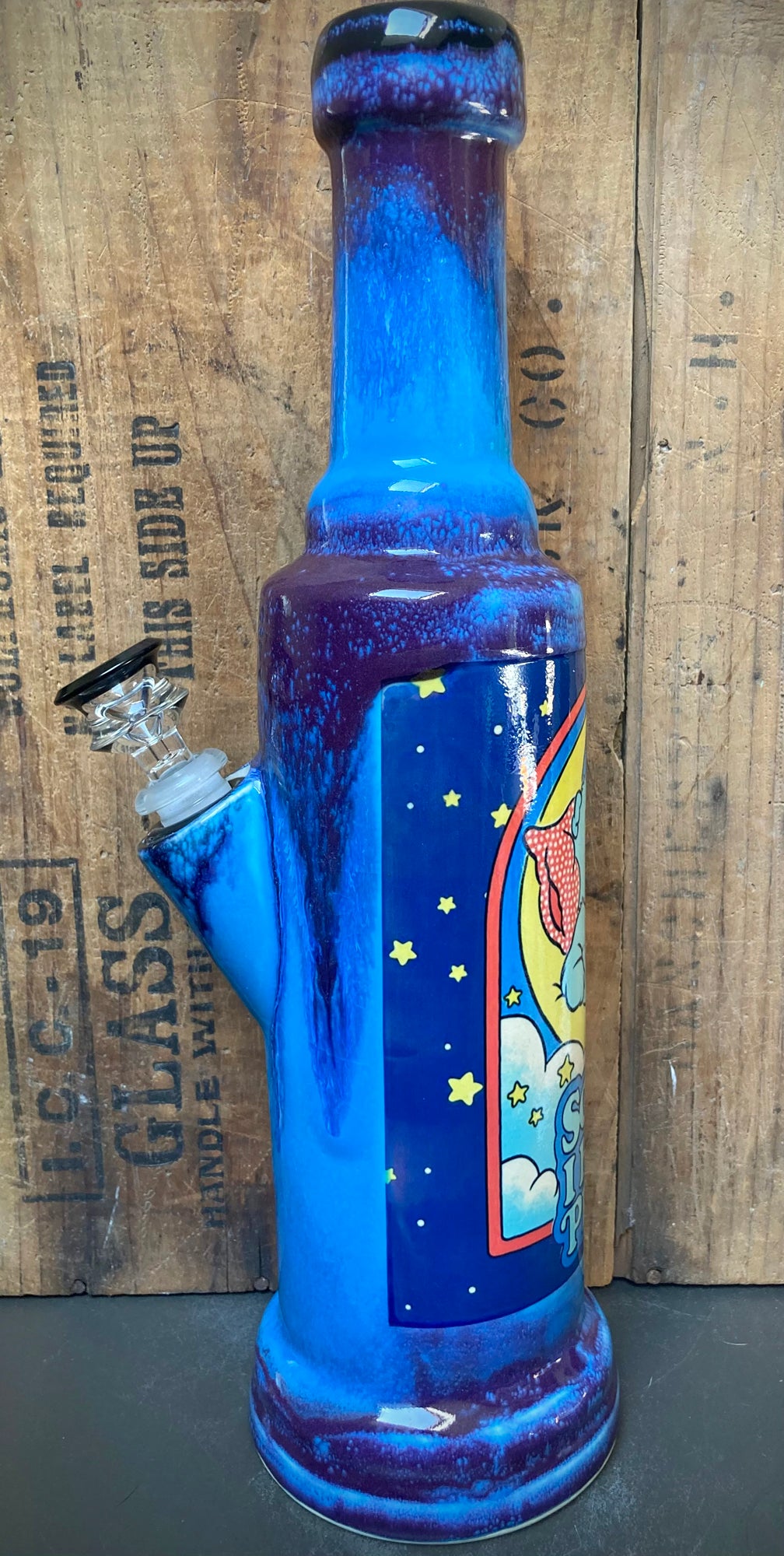 Ceramic Care Bear Bong with vibrant blue and purple design and unique character illustration