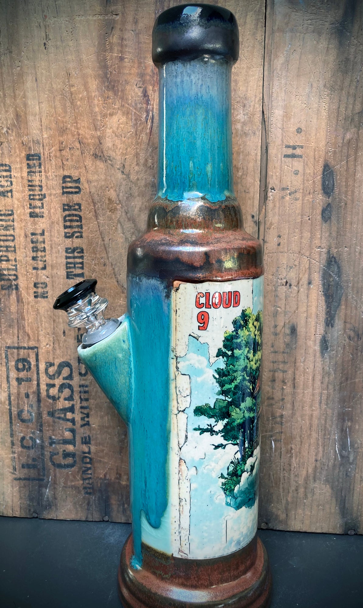 ceramic bong with floating house illustration antique copper finish
