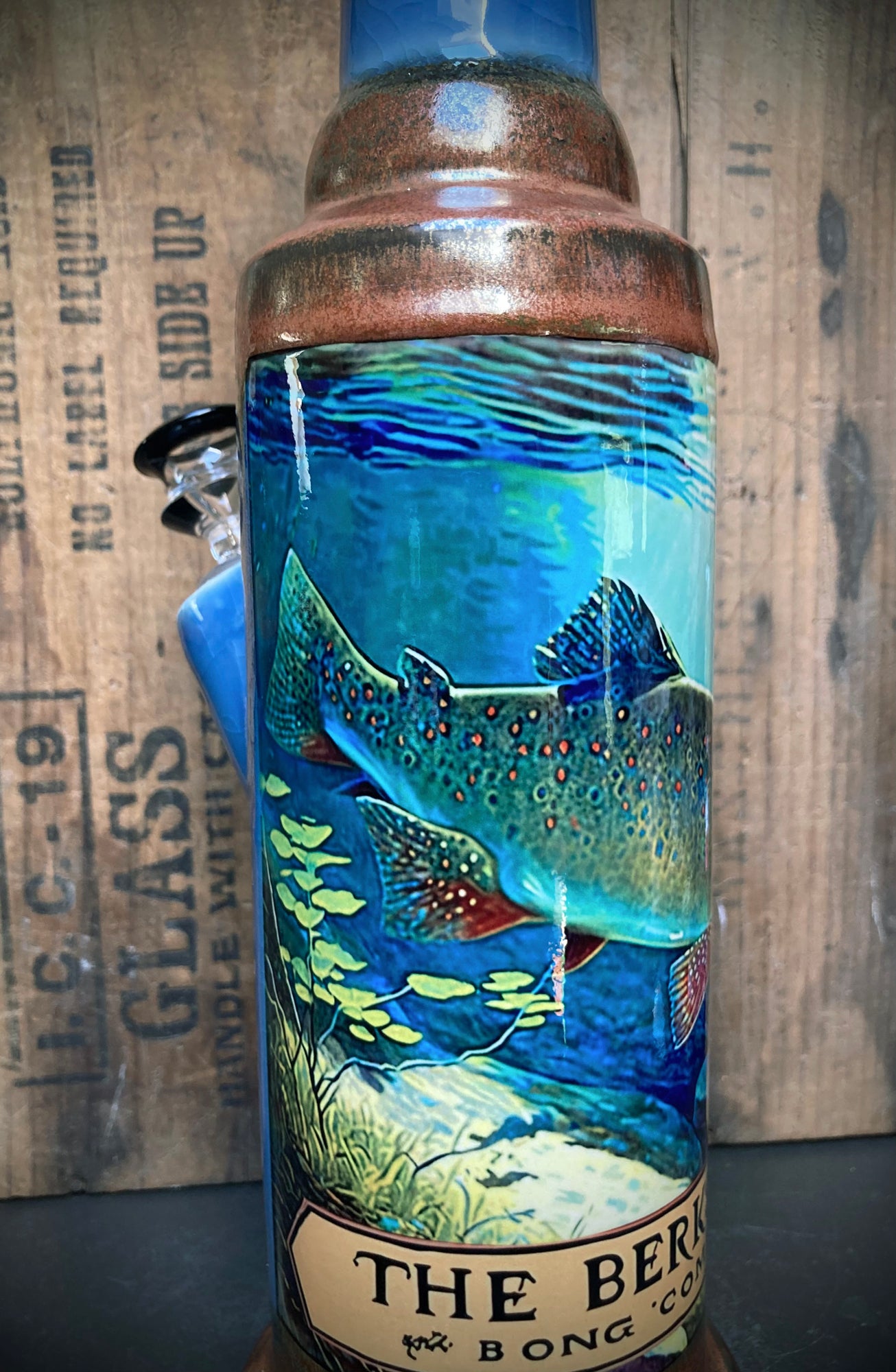 Handcrafted pottery bong with vibrant fish art clear river stream and copper glaze