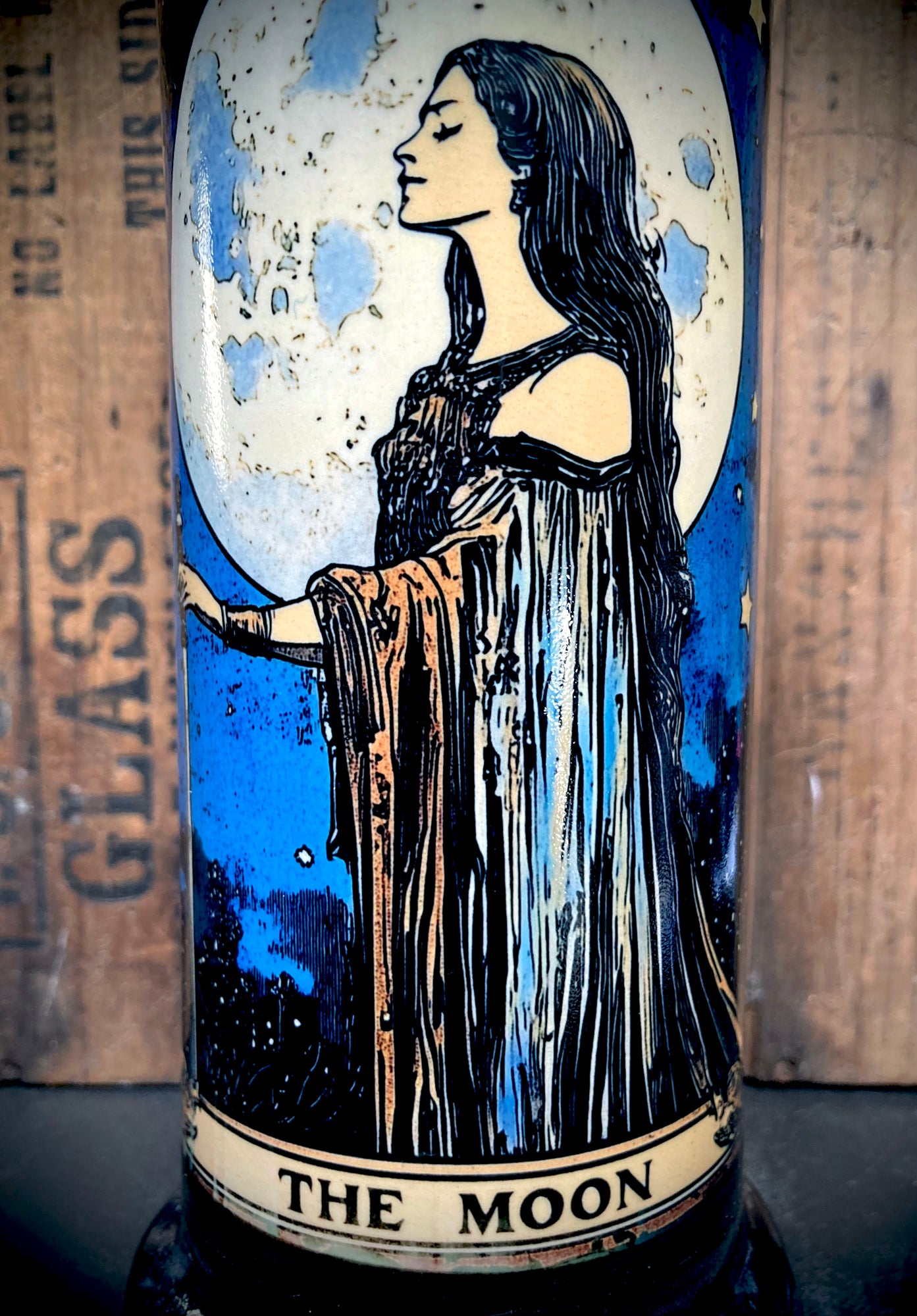 Profile shot highlighting the woman’s flowing hair and serene lunar energy.