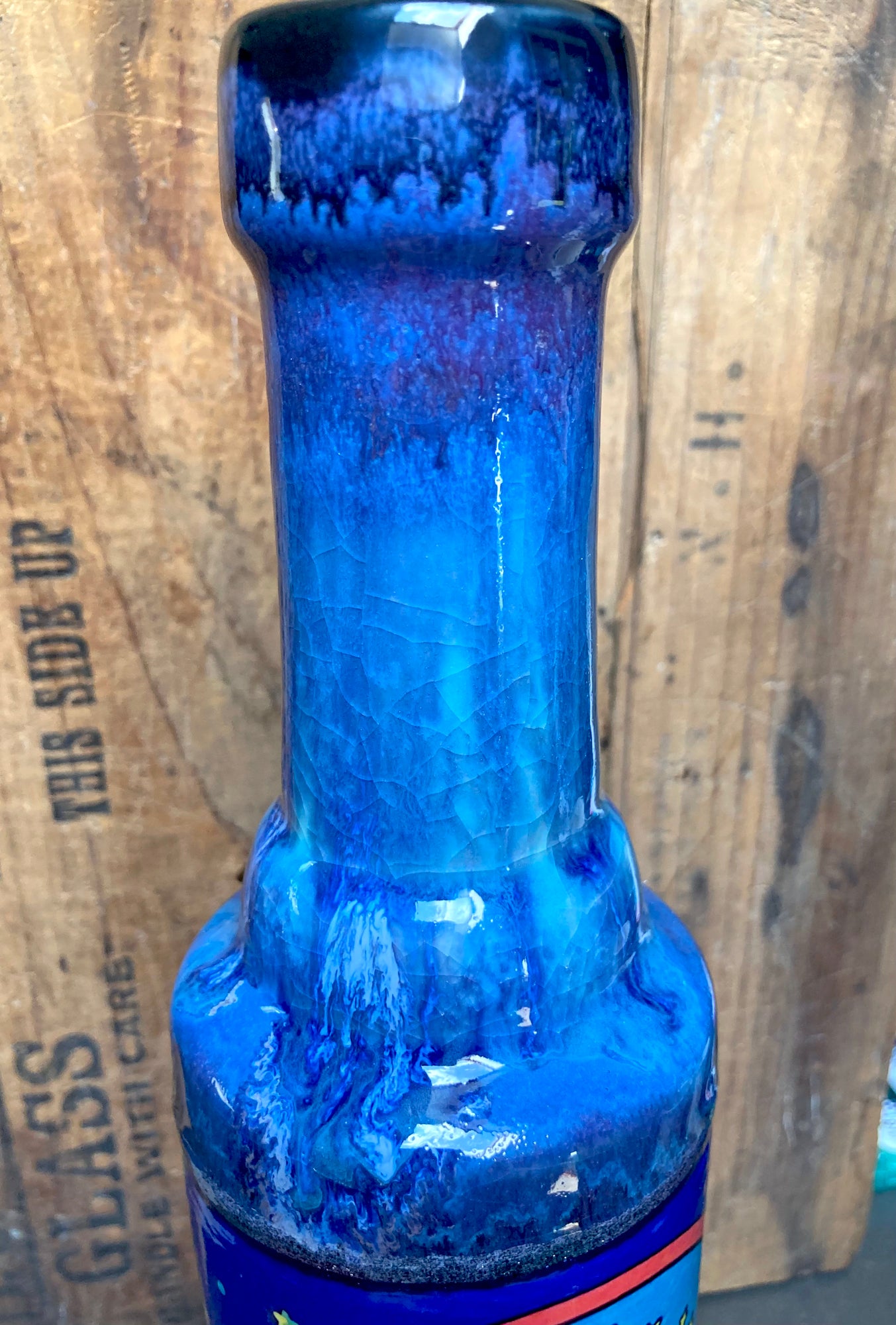 Handmade Ceramic Bong Cute Care Bear Moon Art blue glazed ceramic bong neck close up showing drippy ocean tones on wood