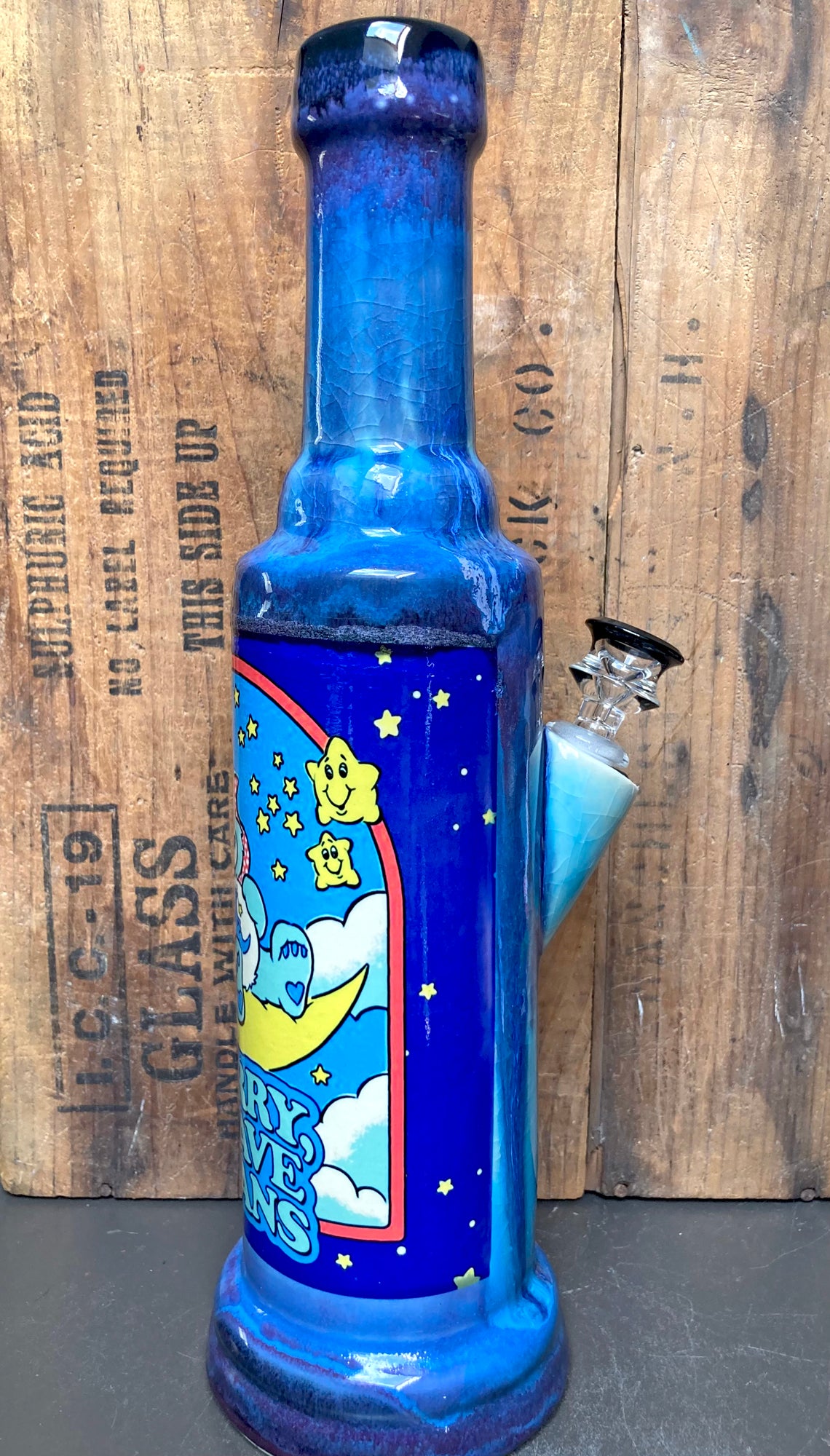 Berkshire Bong Company tall blue ceramic pipe featuring Handmade Ceramic Bong Cute Care Bear Moon Art panel with stars and rainbow