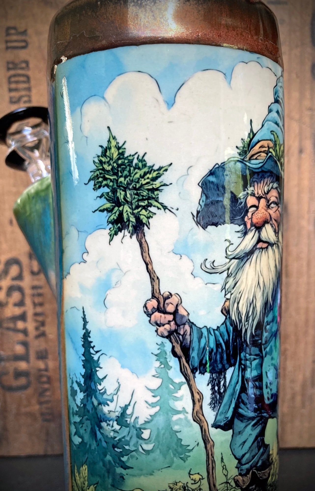 Handmade ceramic bong with glossy turquoise glaze and antique copper accents.