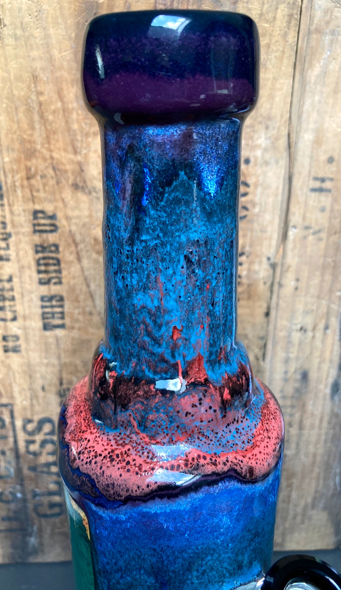 Close up of The New Pyramids Ceramic Bong Mystical Energy by Berkshire Bong Company showing blue red purple glazing