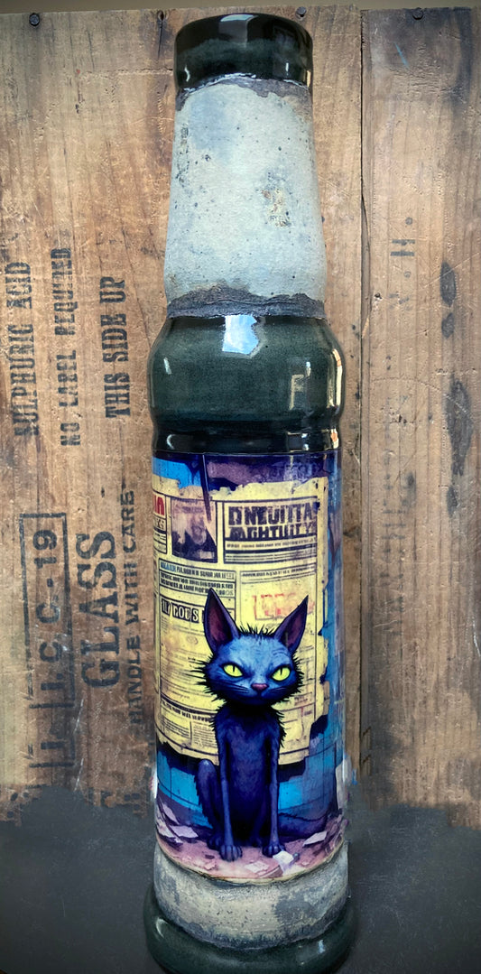 Ceramic bong with bold black cat design and urban graffiti flair.