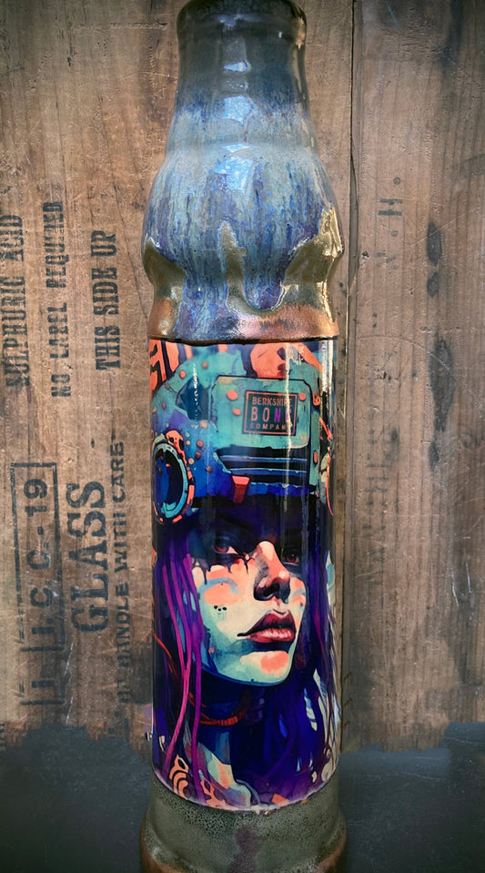 Purple-haired space traveler illustrated on ceramic bong with rocket art.