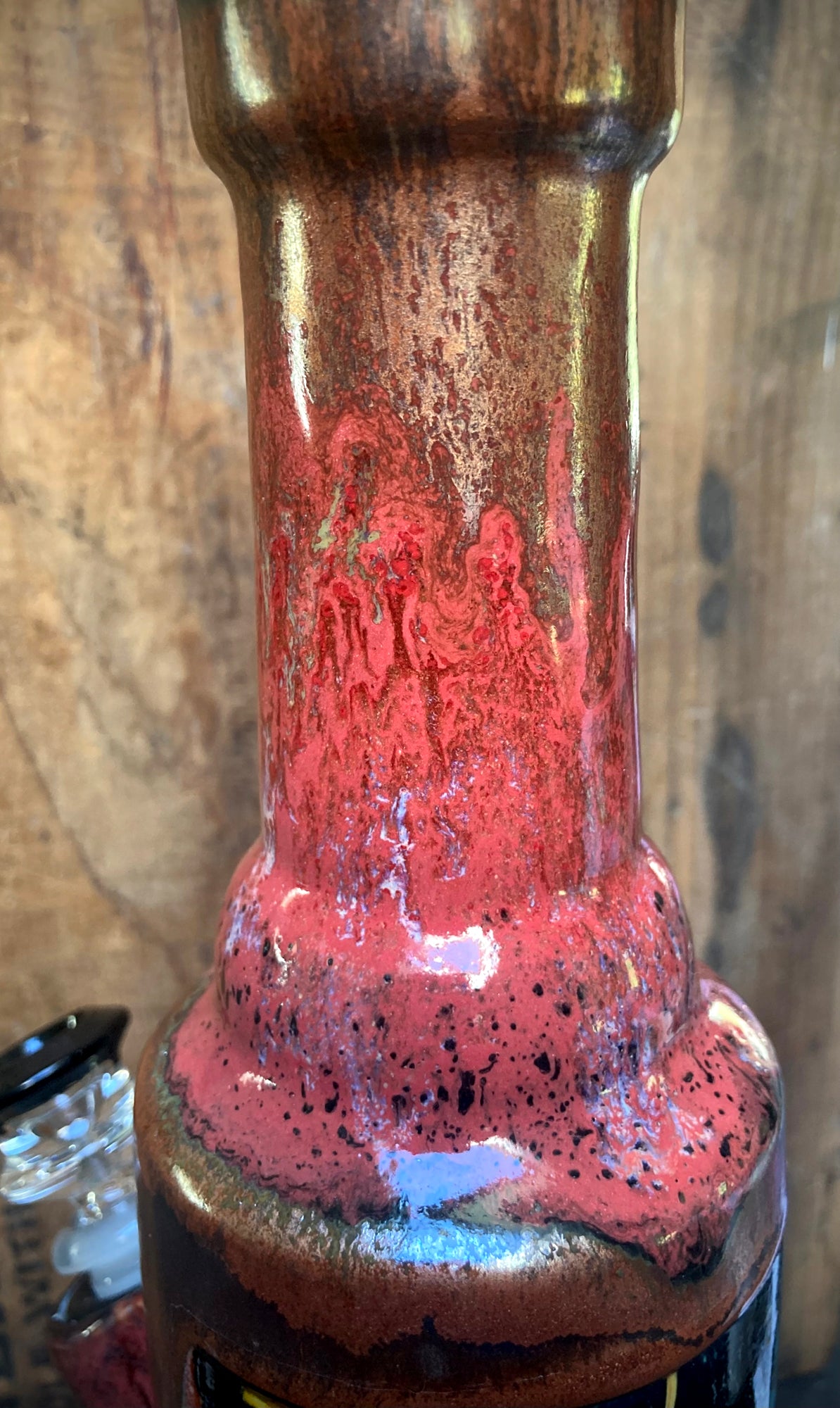 Close-up of colorful ceramic bongs featuring vintage comic art designs from Berkshire Bong Company