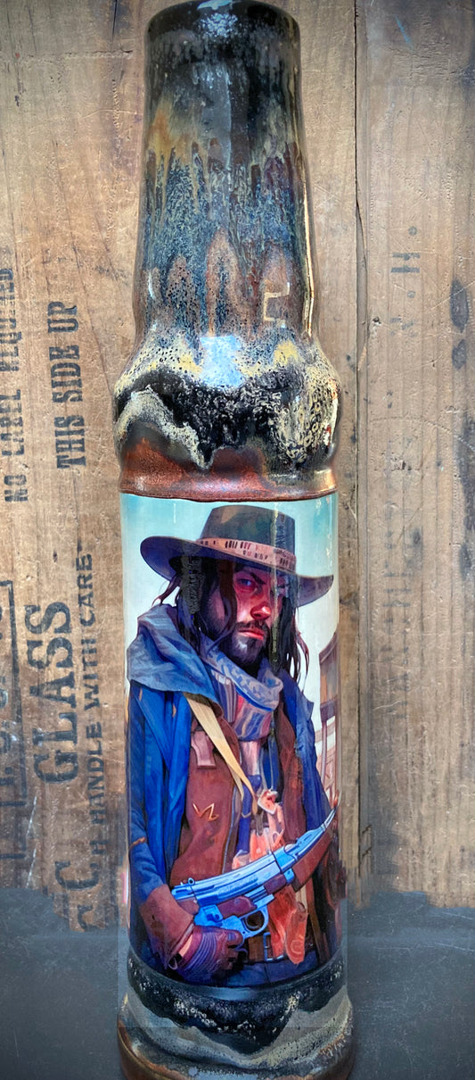 Outlaw themed ceramic bong with vintage Wild West weaponry illustration.