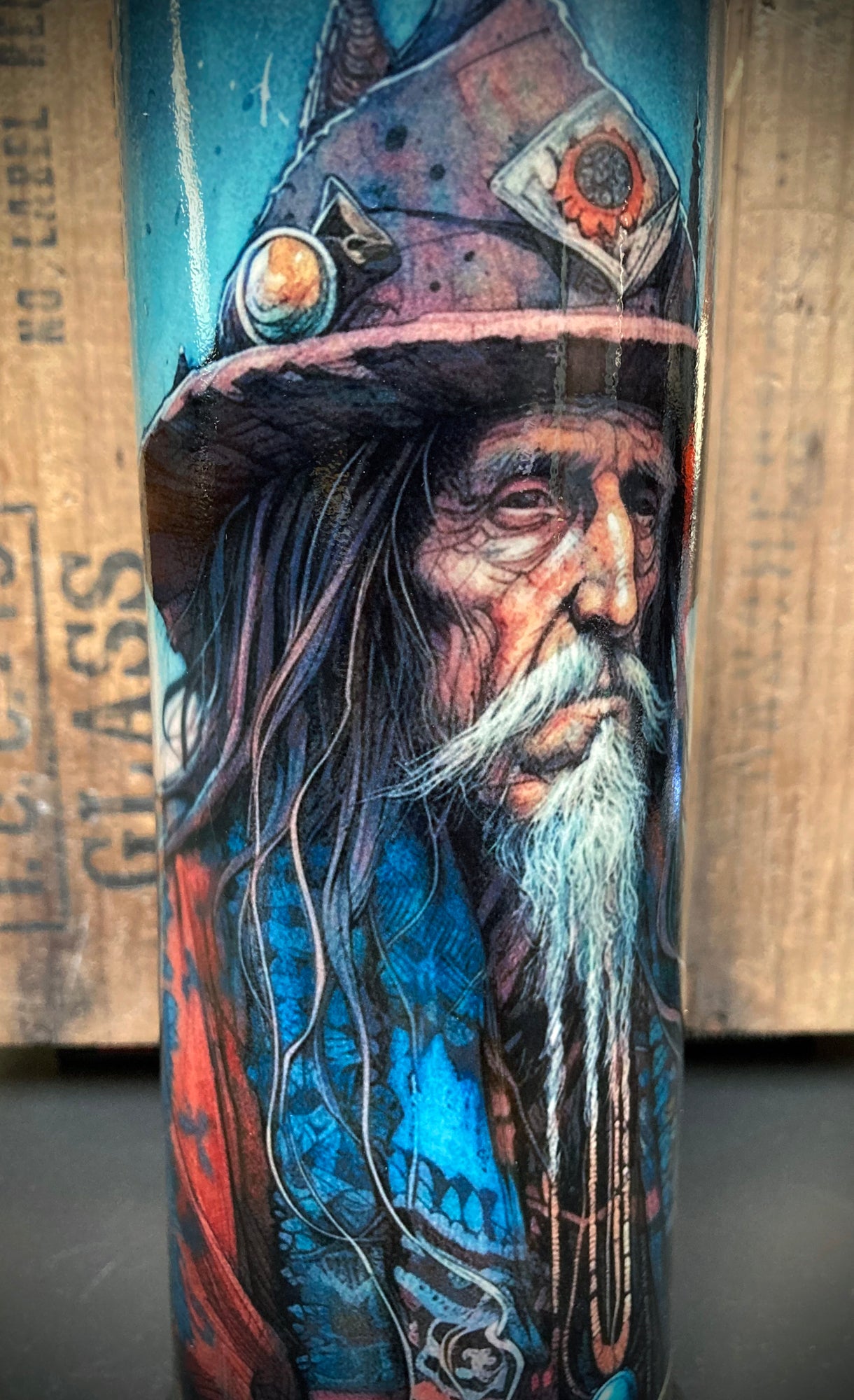 Ceramic bong showing bearded Father Time with earthy copper and blue glazes.