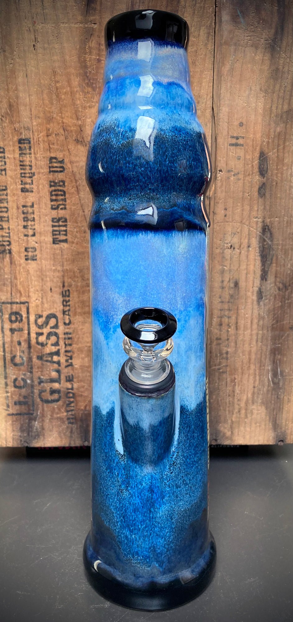 Vintage-inspired Sea Monkey art on ceramic bong with blue glaze combo.