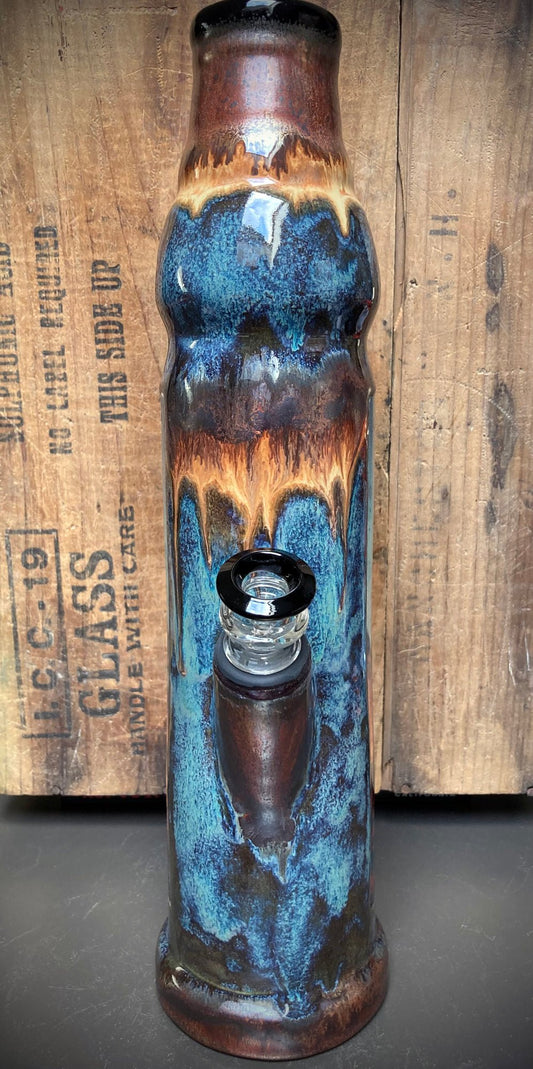 Ceramic bong featuring wise Father Time with a long white beard and earthy glazes.