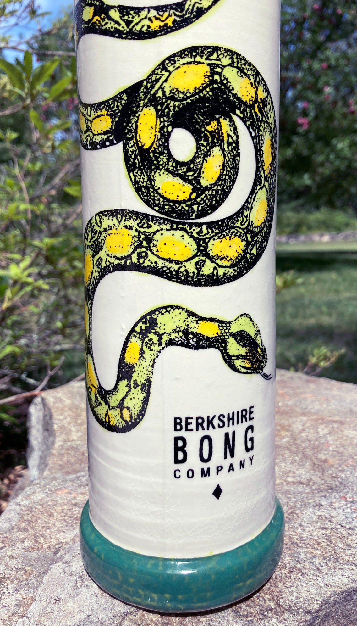 Berkshire Bong Company ceramic snake bong featuring intricate snake designs and vibrant colors