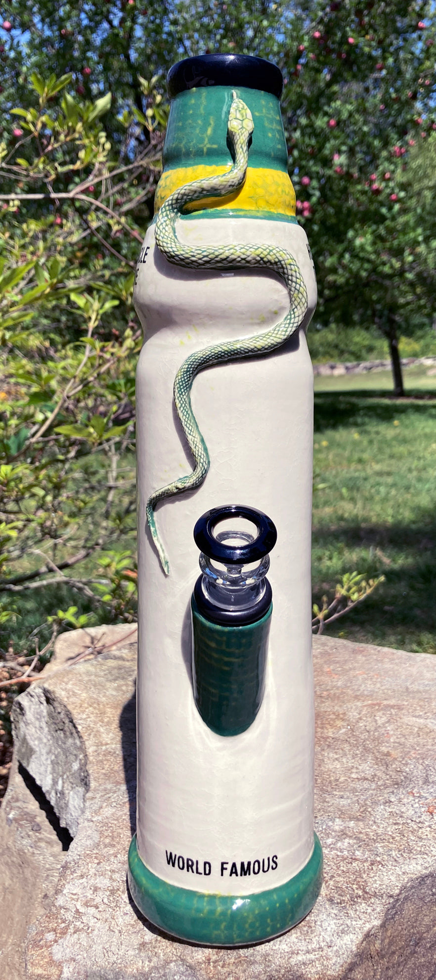 Ceramic snake bong by Berkshire Bong Company with intricate snake design and vibrant colors