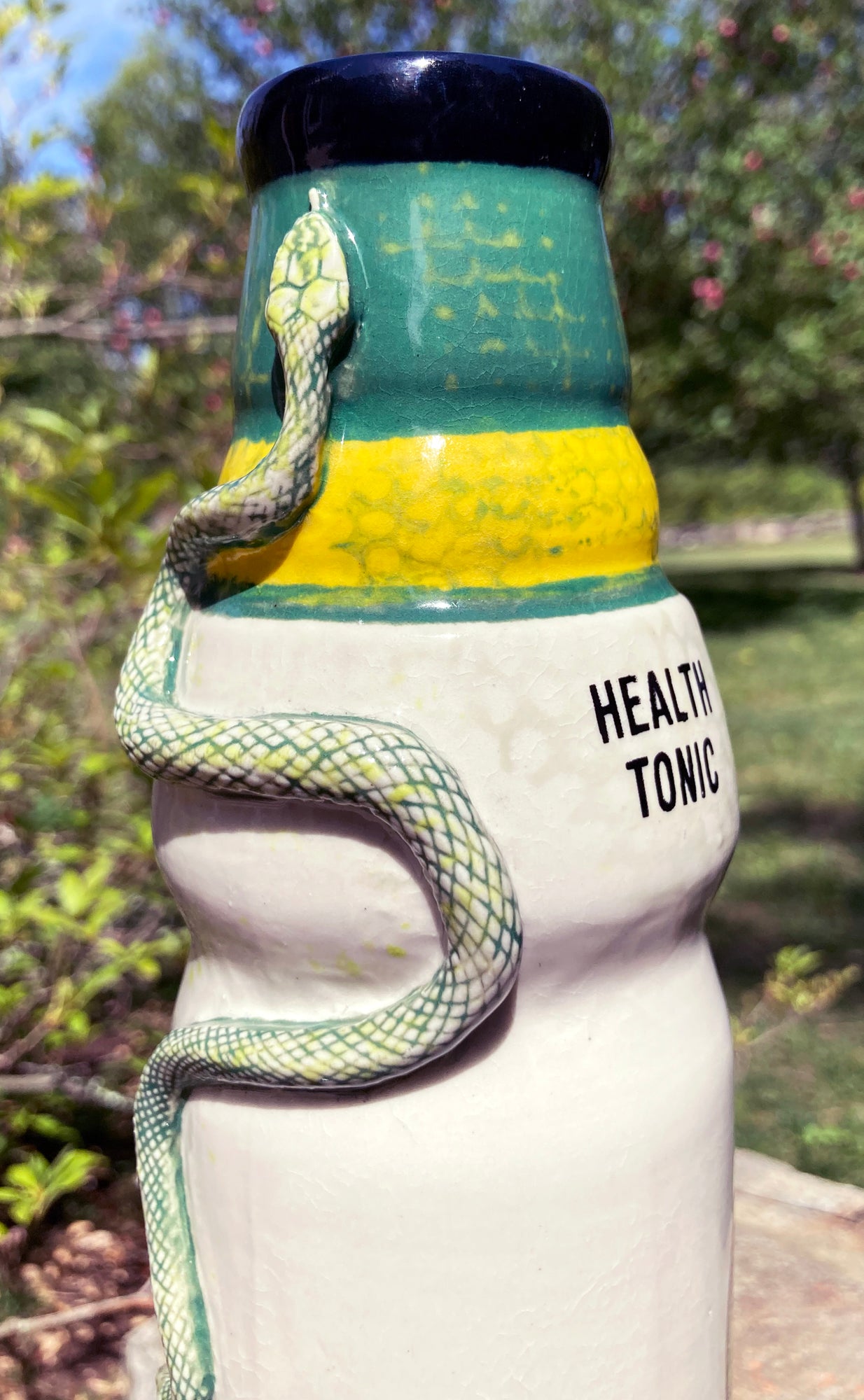 Ceramic snake bong by Berkshire Bong Company featuring a detailed snake design and vibrant colors