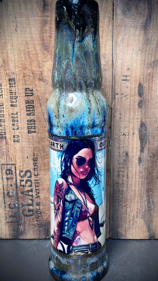 Badass Ceramic Bong New Earth Outlaw Woman featuring vibrant artwork and unique bottle design
