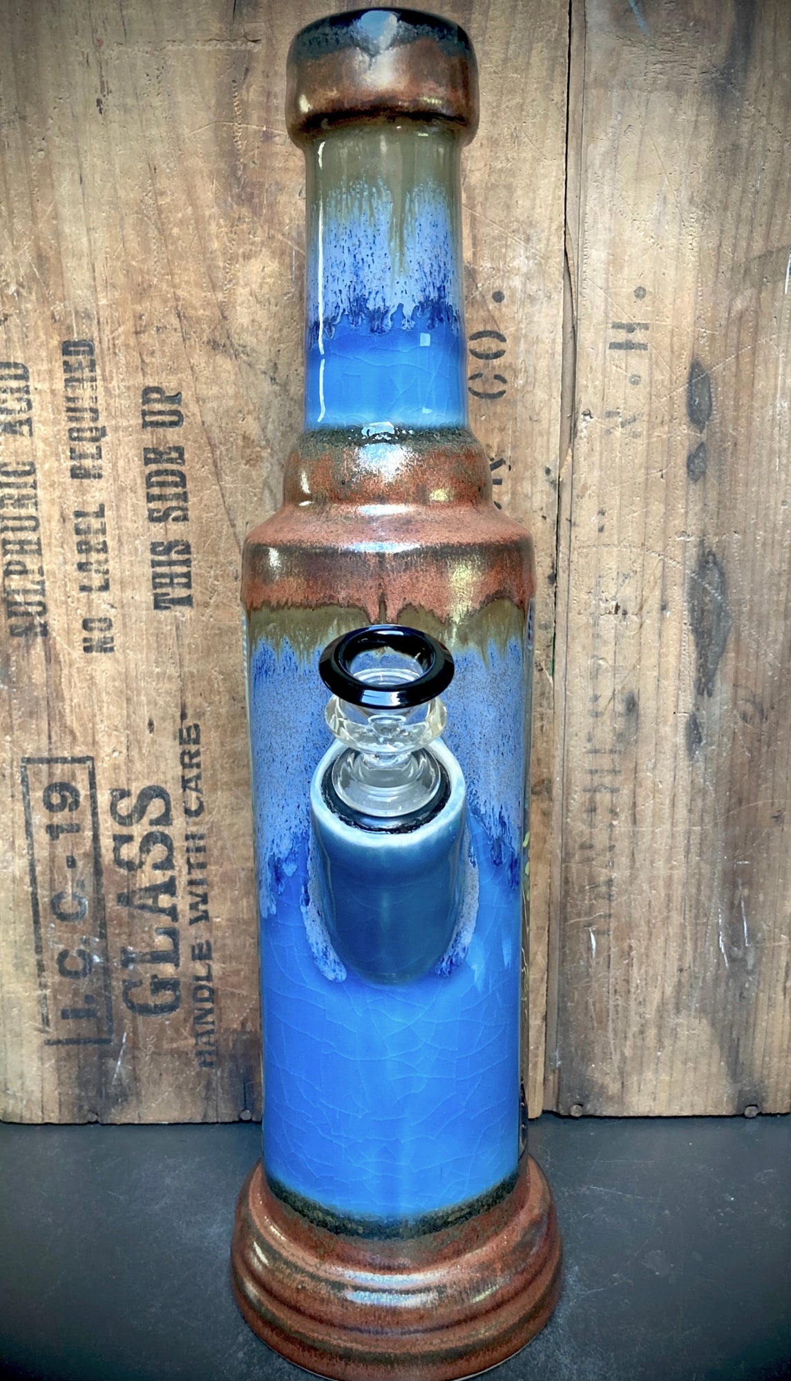 Wild brook trout ripping through blue river water on a ceramic bong