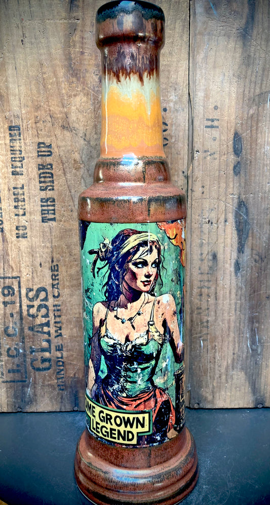 Artistic ceramic bong showing Home Grown Legend art with glossy and weathered finish.