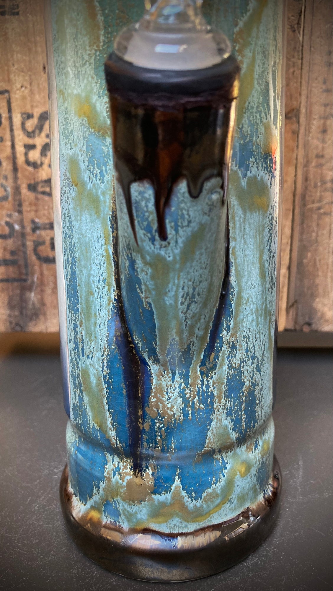Softly glazed ceramic bong featuring serene goddess of the water.
