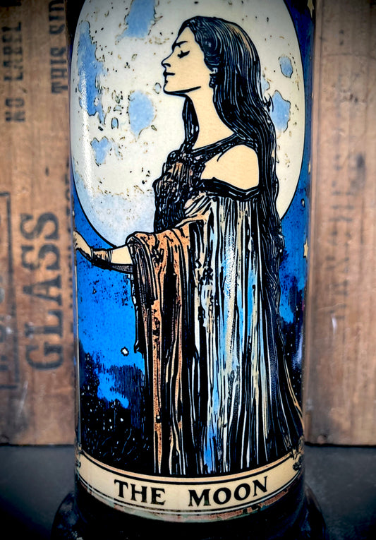 Profile shot highlighting the woman’s flowing hair and serene lunar energy.