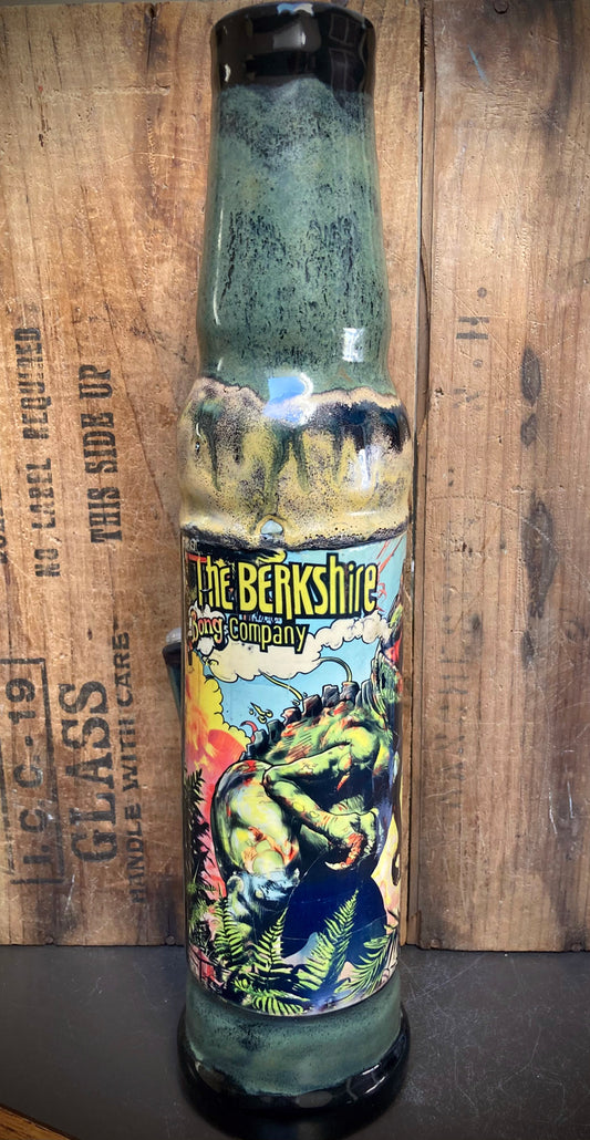 Handmade Ceramic Bong T Rex Jungle Dinosaur featuring vibrant colors and unique design by Berkshire Bong Company