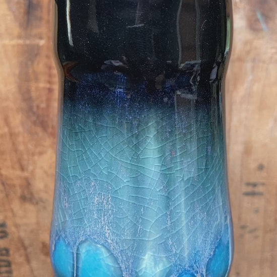 A Handmade ceramic bong glazed with glossy blue and black glazes. Grand Theft Auto 5 graphic on back.