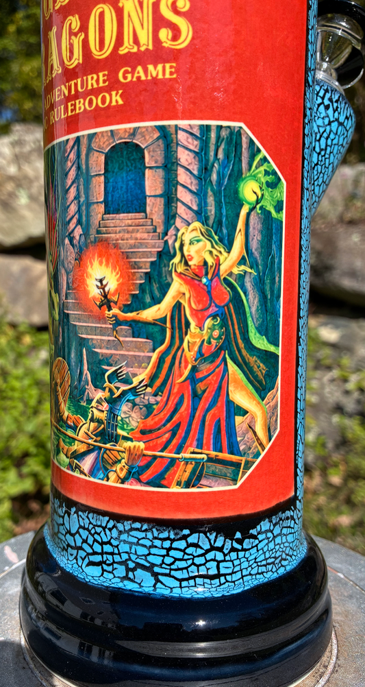 Handmade ceramic bong featuring classic Dungeons & Dragons red rulebook artwork, blue crackle glaze and glossy black accents.