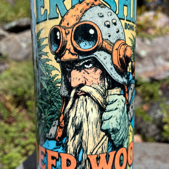 Deep Woods Fight Club handmade ceramic bong featuring vintage bearded woodsman comic artwork, bright blue crackle glaze and glossy black accents.