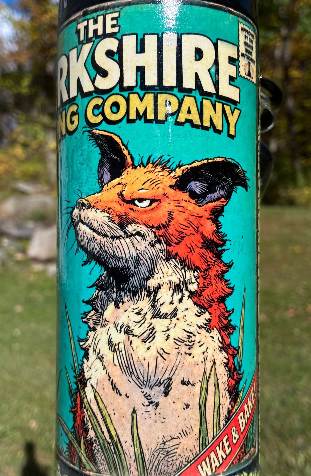 Wake and Bake handmade ceramic fox bong featuring orange fox artwork, neon yellow-green crackle glaze and glossy black accents.