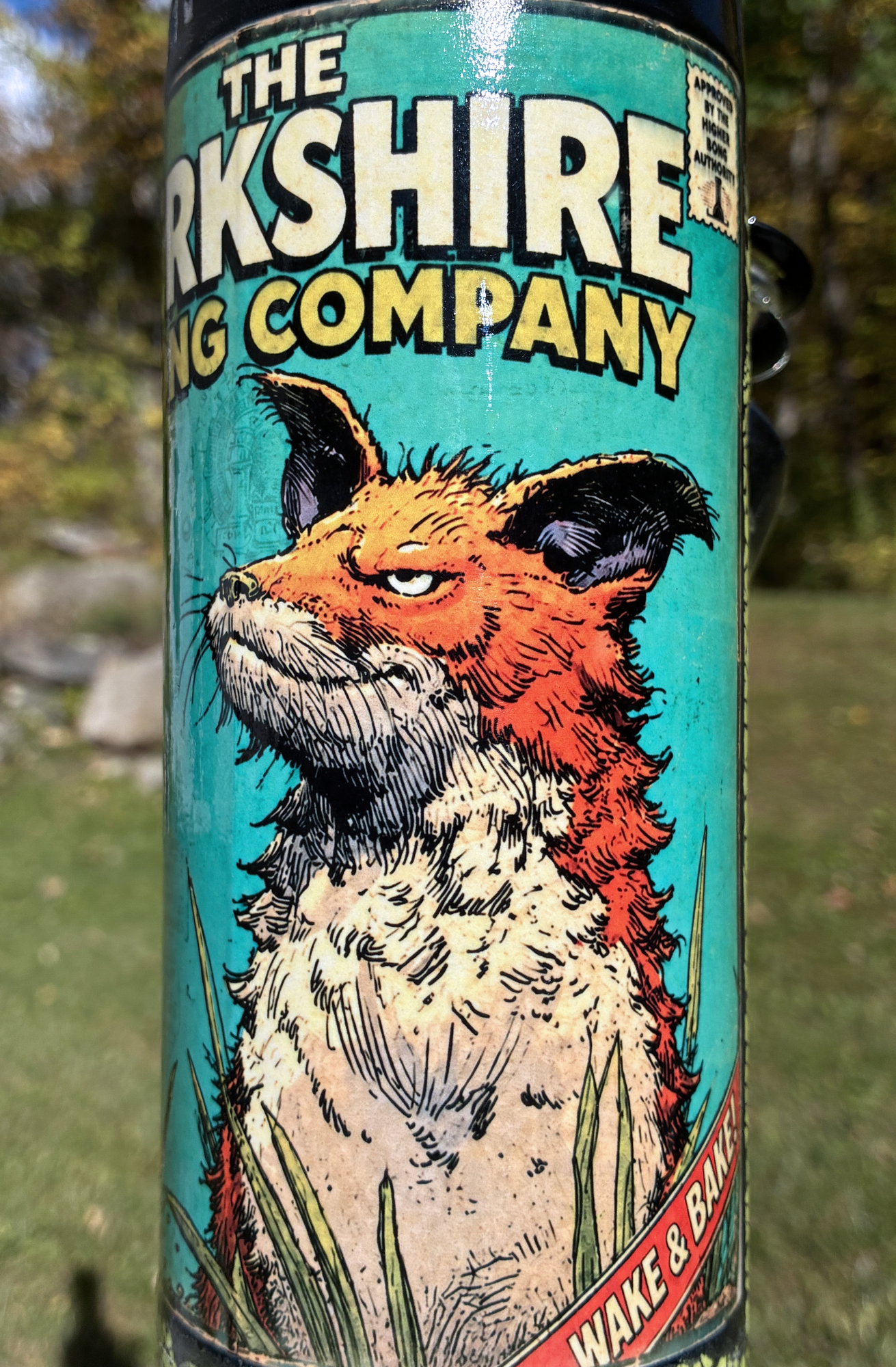 Wake and Bake handmade ceramic fox bong featuring orange fox artwork, neon yellow-green crackle glaze and glossy black accents.