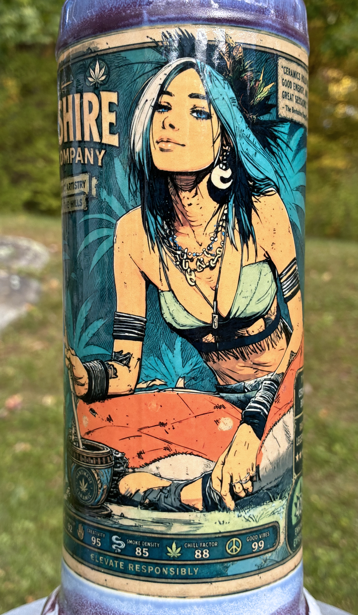 Legendary Mystic handmade ceramic bong featuring vintage mystic collectible-card artwork and flowing purple, lavender and cream glaze.