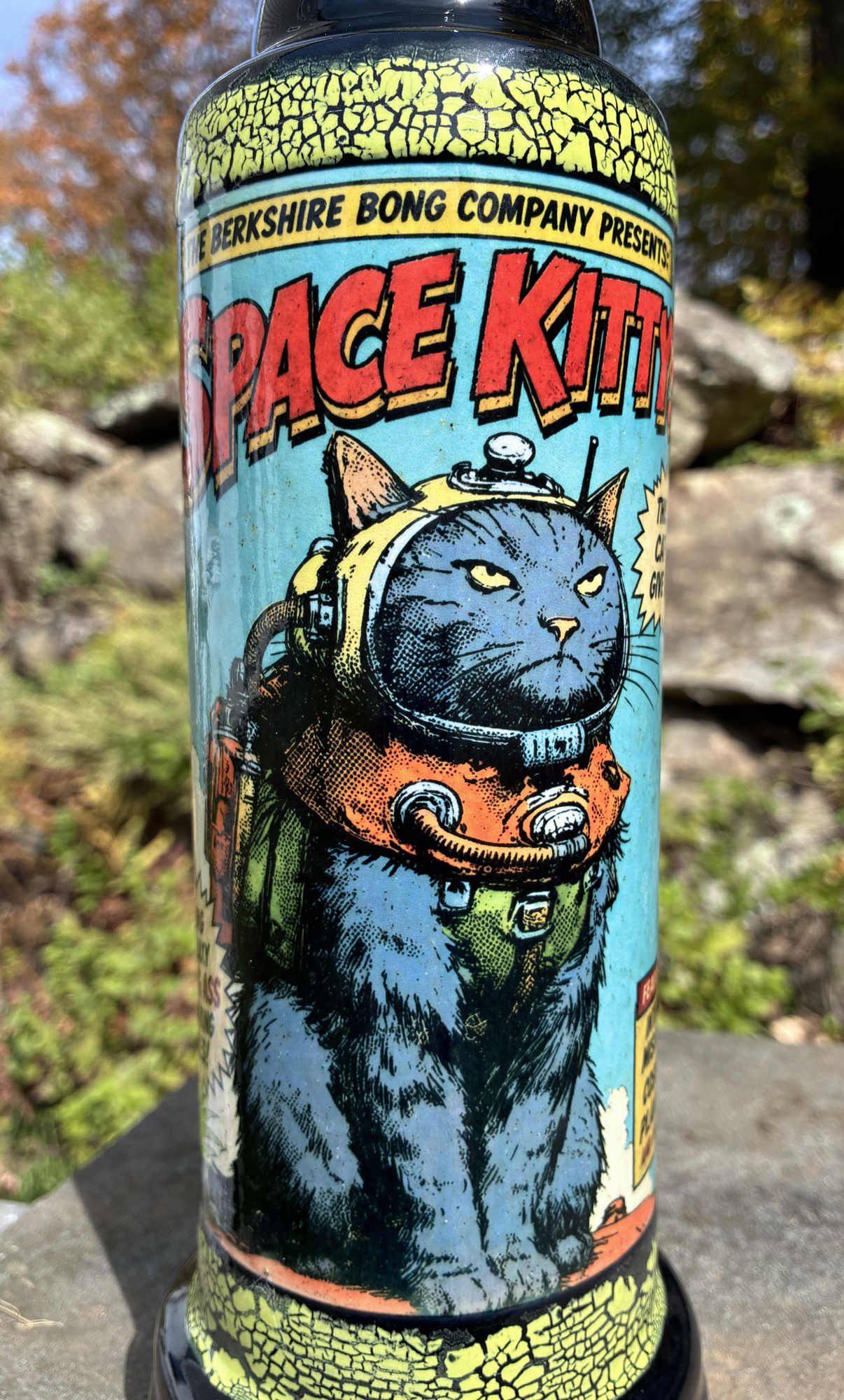 Space Kitty handmade ceramic bong featuring vintage sci-fi comic artwork of a grey alley cat in orange space gear.