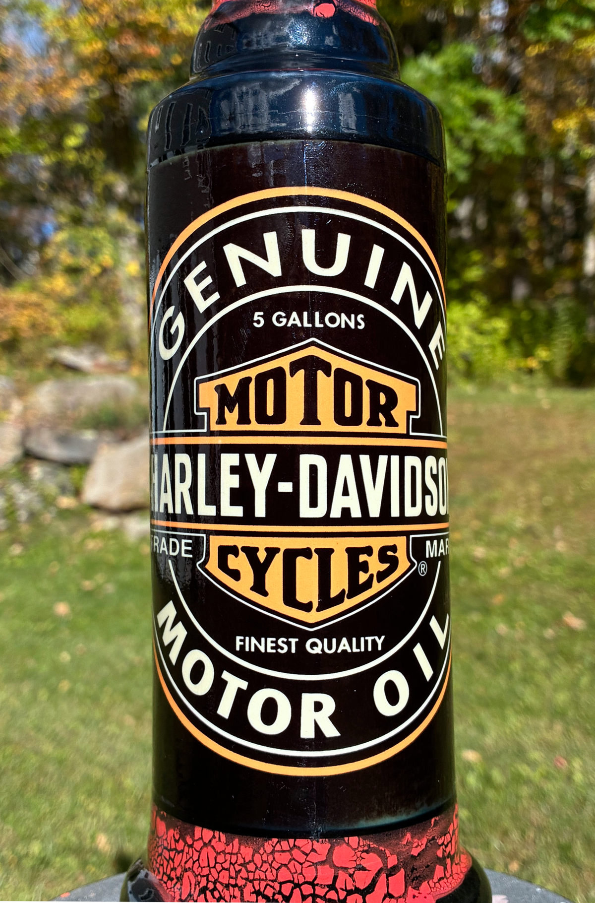 Handmade ceramic bong featuring vintage Harley-Davidson oil-can artwork, red crackle glaze and glossy black accents.