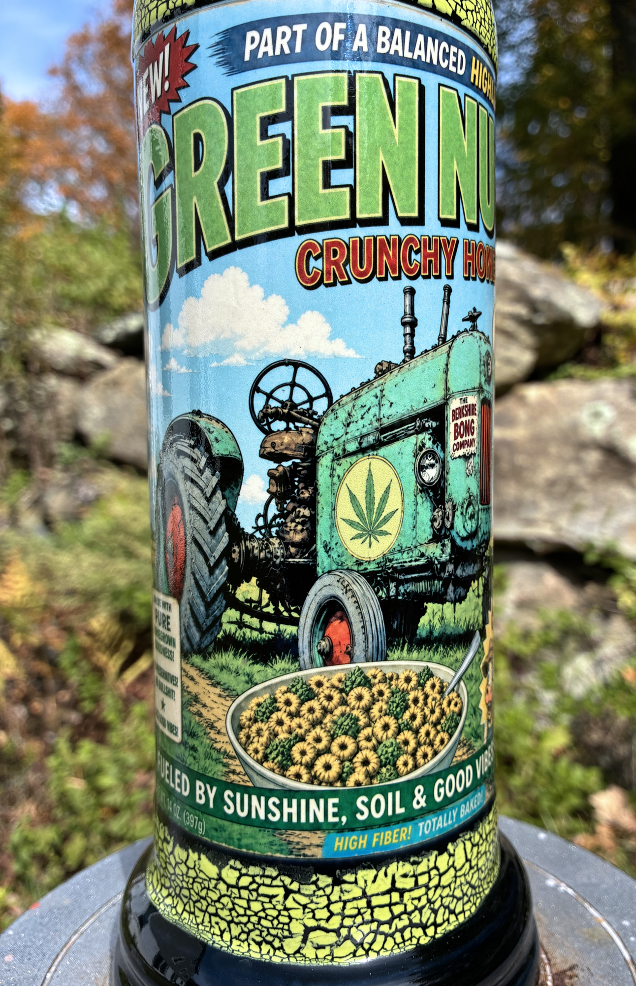 Green Nugs handmade ceramic bong featuring vintage cereal-box artwork with a green tractor, neon yellow-green crackle glaze and glossy black accents.