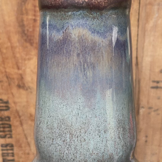 Ceramic bong with a purple critter and bong on the back. Graffiti like Banksy reads The Berkshire Bong Company