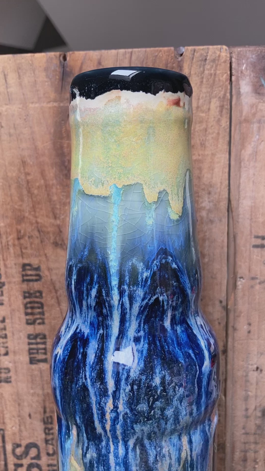 Ceramic bong with trippy art on the back