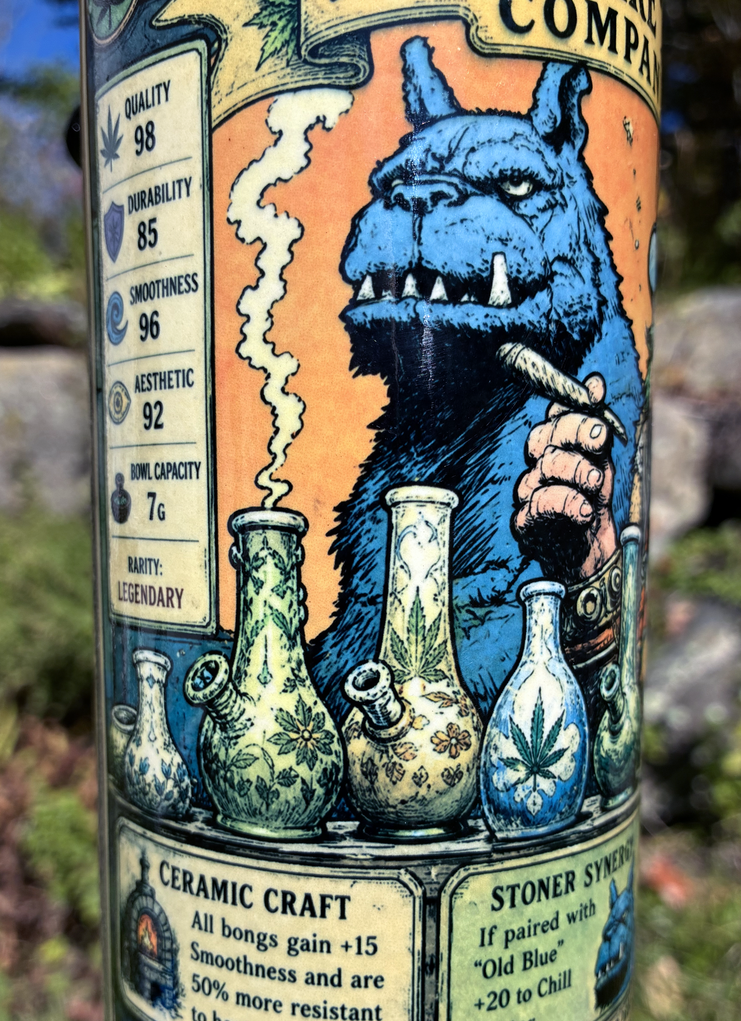 Old Blue and the Bong Maker handmade ceramic bong featuring fantasy collector-card artwork, yellow and copper glaze, and glossy dark accents