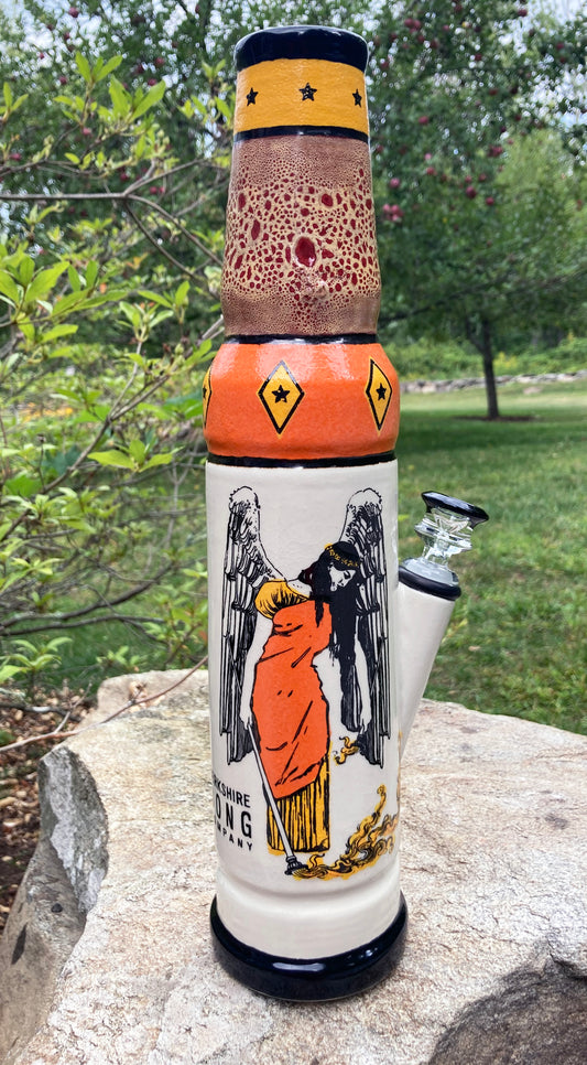 Ceramic bong featuring an Art Nouveau guardian angel in warm orange and yellow glazes.