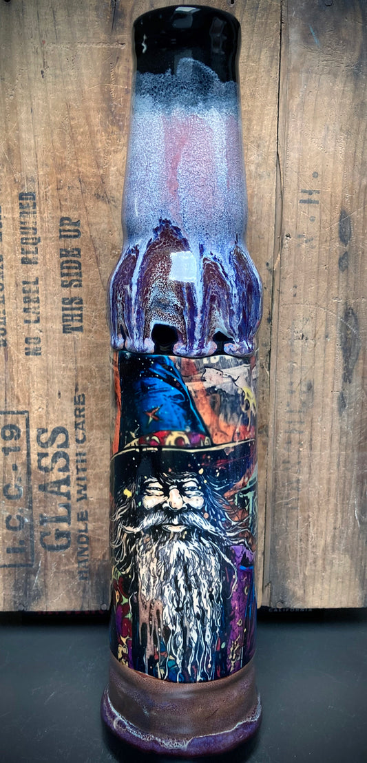 Glossy ceramic bong featuring a wise medicine man with long beard.